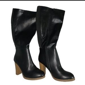 Woman’s  black tall heeled boots